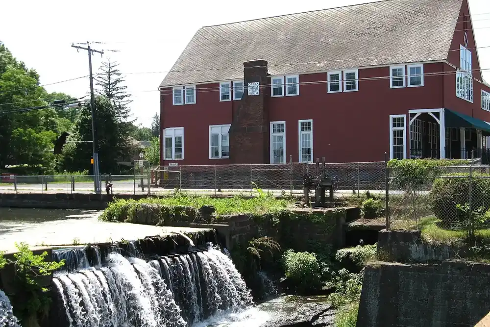 Broad Brook dam and the historic opera house building in East Windsor, Connecticut