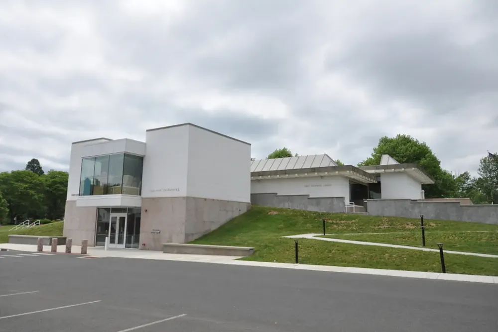 Modern public library building and a quiet parking area in Suffield, Connecticut