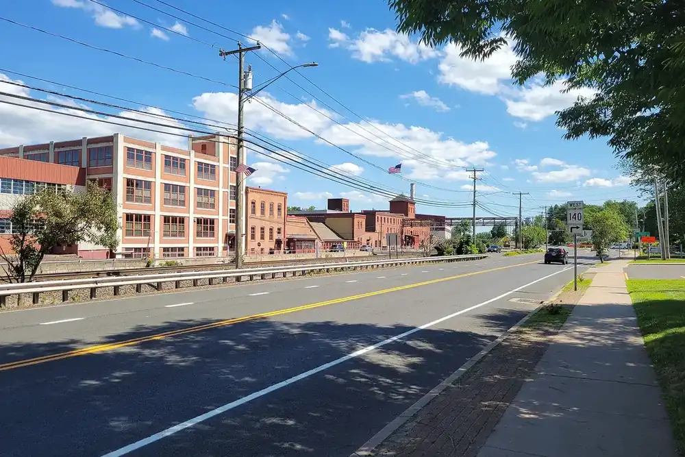 Main Street passing old brick mill buildings in Windsor Locks, Connecticut